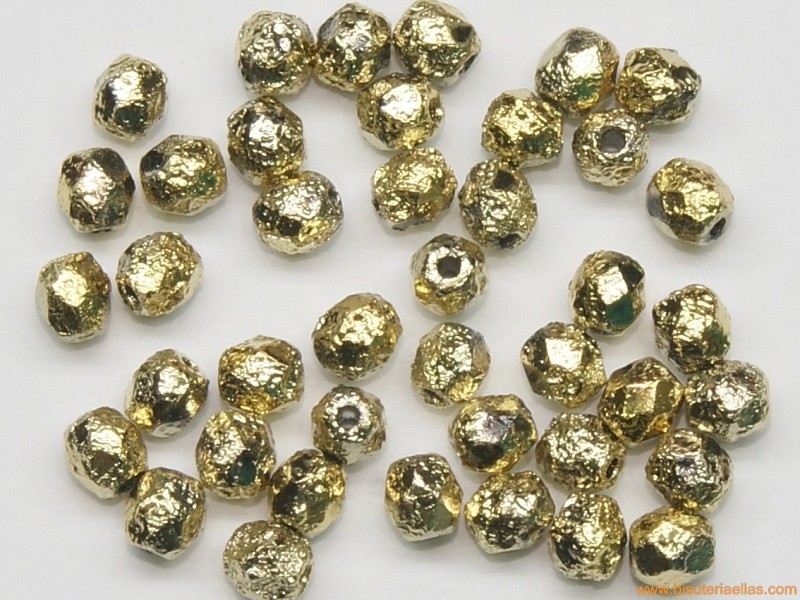 Bola facetada 4mm dorado relieve