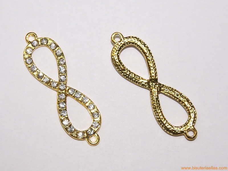 Entrepieza infinito con strass 38x13mm dorada